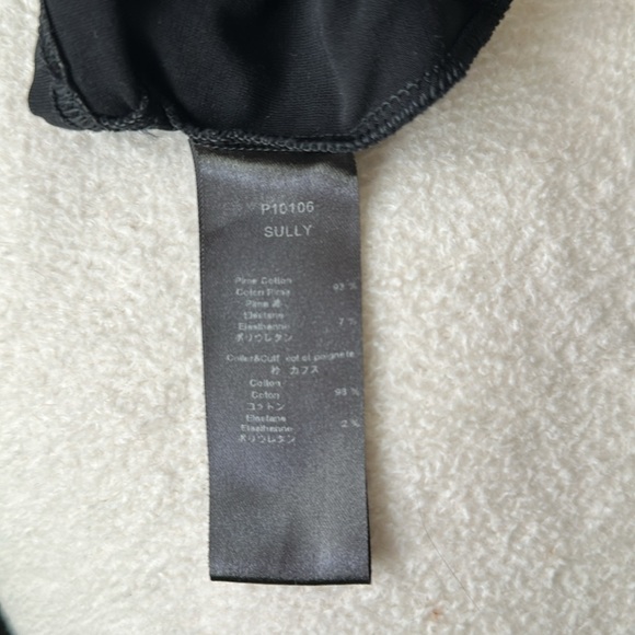 Anne Fontaine Sully black short sleeve top with mini polka dots and ruffles. - Picture 7 of 8